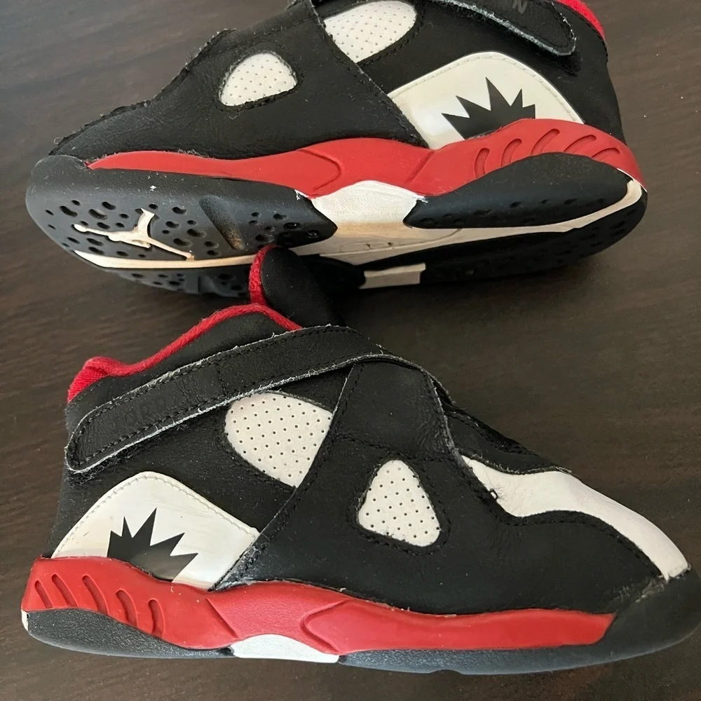 Jordan Black and Red Sneakers with Cross-Straps